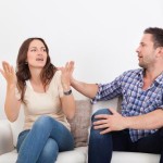 couple-couch-fighting-each-other
