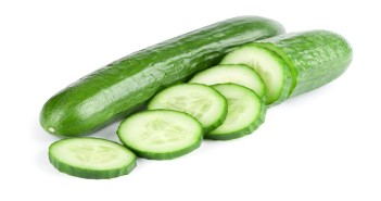 Cucumber and slices isolated over white background