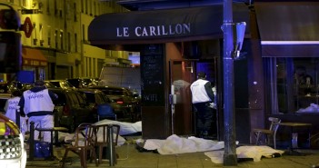 General view of the scene that shows the covered bodies outside a restaurant following a shooting incident in Paris