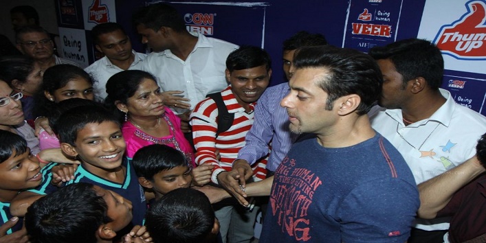 310340-salman-khan-with-the-children-at-the-launch-thumps-up-being-hum.jpg